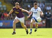 9 June 2018; Gavin Crotty of Waterford in action against Naomhan Rossiter of Wexford during the GAA Football All-Ireland Senior Championship Round 1 match between Wexford and Waterford at Innovate Wexford Park in Wexford. Photo by Matt Browne/Sportsfile