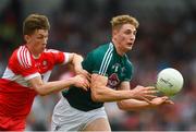 9 June 2018; Daniel Flynn of Kildare in action against Paul McNeill of Derry during the GAA Football All-Ireland Senior Championship Round 1 match between Derry and Kildare at Derry GAA Centre of Excellence, Owenbeg, Derry. Photo by Piaras Ó Mídheach/Sportsfile