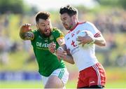 9 June 2018; Matthew Donnelly of Tyrone in action against Mickey Burke of Meath during the GAA Football All-Ireland Senior Championship Round 1 match between Meath and Tyrone at Páirc Táilteann in Navan, Co Meath. Photo by Stephen McCarthy/Sportsfile