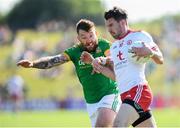 9 June 2018; Matthew Donnelly of Tyrone in action against Mickey Burke of Meath during the GAA Football All-Ireland Senior Championship Round 1 match between Meath and Tyrone at Páirc Táilteann in Navan, Co Meath. Photo by Stephen McCarthy/Sportsfile