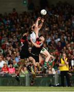 9 June 2018; Darragh Treacy of Limerick in action against Cian Hanley and Aidan O'Shea of Mayo during the GAA Football All-Ireland Senior Championship Round 1 match between Limerick and Mayo at the Gaelic Grounds in Limerick. Photo by Diarmuid Greene/Sportsfile