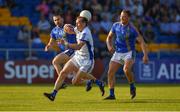 9 June 2018; Martin Reilly of Cavan in action against Dan Keane, left, and Dean Healy of Wicklow during the GAA Football All-Ireland Senior Championship Round 1 match between Wicklow and Cavan at Joule Park in Aughrim, Wicklow. Photo by Harry Murphy/Sportsfile