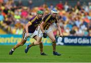 9 June 2018; TJ Reid of Kilkenny in action against Matthew O'Hanlon of Wexford during the Leinster GAA Hurling Senior Championship Round 5 match between Kilkenny and Wexford at Nowlan Park in Kilkenny. Photo by Daire Brennan/Sportsfile