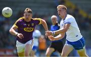 9 June 2018; Kieran Power of Waterford in action against Naomhan Rossiter of Wexford during the GAA Football All-Ireland Senior Championship Round 1 match between Wexford and Waterford at Innovate Wexford Park in Wexford. Photo by Matt Browne/Sportsfile