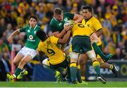 9 June 2018; Jordi Murphy of Ireland is tackled by Will Genia, left, and David Pocock of Australia during the 2018 Mitsubishi Estate Ireland Series 1st Test match between Australia and Ireland at Suncorp Stadium, in Brisbane, Australia. Photo by Brendan Moran/Sportsfile