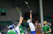 10 June 2018; Gavin Fives, left, and Rory Furlong of Waterford in action against Bob Purcell of Limerick during the Electric Ireland Munster GAA Hurling Minor Championship match between Limerick and Waterford at the Gaelic Grounds in Limerick. Photo by Ramsey Cardy/Sportsfile
