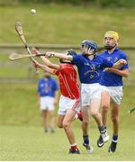 10 June 2018; James Kenefick of St Finbarrs, Co Cork, in action against Joe Fitzgerald of Monaleen, Co Limerick during the Division 1 Hurling shield semi-final between St Finbarrs, Co Cork and Monaleen, Co Limerick, at the John West Féile na nGael national competition which took place this weekend across Connacht, Westmeath and Longford. This is the third year that the Féile na nGael and Féile Peile na nÓg have been sponsored by John West, one of the world’s leading suppliers of fish. The competition gives up-and-coming GAA superstars the chance to participate and play in their respective Féile tournament, at a level which suits their age, skills and strengths. Photo by Matt Browne/Sportsfile