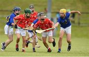 10 June 2018; Joe Fitzgerald of Monaleen, Co Limerick in action against Fionn Crowley of St Finbarrs, Co Cork during the Division 1 Hurling shield semi-final between St Finbarrs, Co Cork and Monaleen, Co Limerick, at the John West Féile na nGael national competition which took place this weekend across Connacht, Westmeath and Longford. This is the third year that the Féile na nGael and Féile Peile na nÓg have been sponsored by John West, one of the world’s leading suppliers of fish. The competition gives up-and-coming GAA superstars the chance to participate and play in their respective Féile tournament, at a level which suits their age, skills and strengths. Photo by Matt Browne/Sportsfile