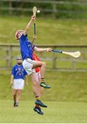 10 June 2018; Cian Buckley of St Finbarrs, Co Cork, in action against Ben Murnane of  Monaleen, Co Limerick, during the Division 1 Hurling shield semi-final between St Finbarrs, Co Cork and Monaleen, Co Limerick, at the John West Féile na nGael national competition which took place this weekend across Connacht, Westmeath and Longford. This is the third year that the Féile na nGael and Féile Peile na nÓg have been sponsored by John West, one of the world’s leading suppliers of fish. The competition gives up-and-coming GAA superstars the chance to participate and play in their respective Féile tournament, at a level which suits their age, skills and strengths. Photo by Matt Browne/Sportsfile