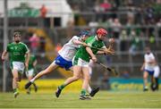 10 June 2018; Michael Keane of Limerick in action against Oisin Ó'Ceallaigh of Waterford during the Electric Ireland Munster GAA Hurling Minor Championship match between Limerick and Waterford at the Gaelic Grounds in Limerick. Photo by Eóin Noonan/Sportsfile