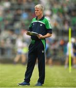 10 June 2018; Limerick manager John Kiely studies the programme prior to the Munster GAA Hurling Senior Championship Round 4 match between Limerick and Waterford at the Gaelic Grounds in Limerick. Photo by Eóin Noonan/Sportsfile