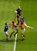 10 June 2018; Seán Murphy of Carlow, centre, and team-mate Eoghan Ruth contest the throw-in at the start of the first half with John O'Loughlin, left, and Kieran Lillis of Laois as referee Fergal Kelly looks on during the Leinster GAA Football Senior Championship Semi-Final match between Carlow and Laois at Croke Park in Dublin. Photo by Piaras Ó Mídheach/Sportsfile