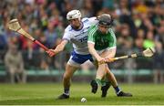 10 June 2018; Graeme Mulcahy of Limerick shoots to score his side's second goal of the game despite the attention of Conor Gleeson of Waterford during the Munster GAA Hurling Senior Championship Round 4 match between Limerick and Waterford at the Gaelic Grounds in Limerick. Photo by Ramsey Cardy/Sportsfile