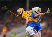 10 June 2018; Conor McGrath of Clare is tackled by Seán O'Brien and Brendan Maher, 7, of Tipperary during the Munster GAA Hurling Senior Championship Round 4 match between Tipperary and Clare at Semple Stadium in Thurles, Tipperary. Photo by Ray McManus/Sportsfile