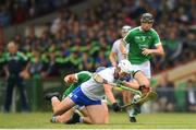 10 June 2018; Tom Devine of Waterford is tackled by Mike Casey of Limerick during the Munster GAA Hurling Senior Championship Round 4 match between Limerick and Waterford at the Gaelic Grounds in Limerick. Photo by Eóin Noonan/Sportsfile
