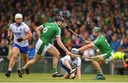 10 June 2018; Kevin Moran of Waterford in action against Declan Hannon of Limerick during the Munster GAA Hurling Senior Championship Round 4 match between Limerick and Waterford at the Gaelic Grounds in Limerick. Photo by Eóin Noonan/Sportsfile