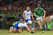 10 June 2018; Tom Devine of Waterford is tackled by Mike Casey of Limerick  during the Munster GAA Hurling Senior Championship Round 4 match between Limerick and Waterford at the Gaelic Grounds in Limerick. Photo by Eóin Noonan/Sportsfile