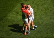 10 June 2018; Laois goalkeeper Graham Brody in a tussle with Daniel St Ledger, behind, and Seán Gannon of Carlow, for which St Ledger was shown the yellow card, during the Leinster GAA Football Senior Championship Semi-Final match between Carlow and Laois at Croke Park in Dublin. Photo by Piaras Ó Mídheach/Sportsfile