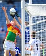 10 June 2018; Mark Timmons of Laois collects the ball on their goal line despite the attention of Darragh Foley of Carlow during the Leinster GAA Football Senior Championship Semi-Final match between Carlow and Laois at Croke Park in Dublin. Photo by Stephen McCarthy/Sportsfile