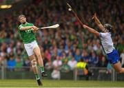 10 June 2018; David Dempsey of Limerick has his shot blocked by Philip Mahony of Waterford during the Munster GAA Hurling Senior Championship Round 4 match between Limerick and Waterford at the Gaelic Grounds in Limerick. Photo by Eóin Noonan/Sportsfile