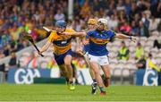 10 June 2018; Shane O'Donnell of Clare  in action against Joe O'Dwyer of Tipperary during the Munster GAA Hurling Senior Championship Round 4 match between Tipperary and Clare at Semple Stadium in Thurles, Tipperary. Photo by Ray McManus/Sportsfile