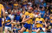 10 June 2018; Peter Duggan of Clare shoots to score the match winning point during the Munster GAA Hurling Senior Championship Round 4 match between Tipperary and Clare at Semple Stadium in Thurles, Tipperary. Photo by David Fitzgerald/Sportsfile