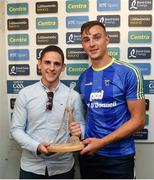 10 June 2018; Presenting Peter Duggan of Clare with his Man of the Match award following the meeting of Tipperary and Clare at Semple Stadium, is Bord Gáis Energy customer David Cody, Company Director at Tipperary Glass. Bord Gáis Energy offers its customers unmissable rewards throughout the Championship season, including match tickets and hospitality, access to training camps with Hurling stars and the opportunity to present Man of the Match Awards. Photo by David Fitzgerald/Sportsfile