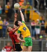 10 June 2018; Michael Langan of Donegal in action against Darren O'Hagan of Down during the Ulster GAA Football Senior Championship Semi-Final match between Donegal and Down at St Tiernach's Park in Clones, Monaghan. Photo by Philip Fitzpatrick/Sportsfile