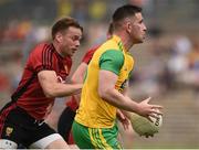 10 June 2018; Patrick McBrearty of Donegal in action against Brendan McArdle of Down  during the Ulster GAA Football Senior Championship Semi-Final match between Donegal and Down at St Tiernach's Park in Clones, Monaghan. Photo by Oliver McVeigh/Sportsfile