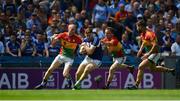 10 June 2018; Evan O'Carroll of Laois in action against Carlow players, left to right, Cian Lawler, Chris Crowley, and Daniel St Ledger during the Leinster GAA Football Senior Championship Semi-Final match between Carlow and Laois at Croke Park in Dublin. Photo by Daire Brennan/Sportsfile