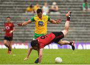 10 June 2018; Niall Donnelly of Down in action against Paul Brennan of Donegal  during the Ulster GAA Football Senior Championship Semi-Final match between Donegal and Down at St Tiernach's Park in Clones, Monaghan. Photo by Oliver McVeigh/Sportsfile
