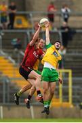 10 June 2018; Niall Donnelly of Down in action against Ryan McHugh and Michael Murphy, left, of Donegal during the Ulster GAA Football Senior Championship Semi-Final match between Donegal and Down at St Tiernach's Park in Clones, Monaghan. Photo by Philip Fitzpatrick/Sportsfile