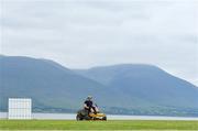 10 June 2018; Groundsman Sean Rutland, from Tralee, Kerry, cuts the grass in the outfield prior to the All Rounder Munster Premier Division match between County Kerry and Cork Harlequins at the Oyster Oval in Tralee, Co Kerry. Photo by Seb Daly/Sportsfile