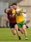 10 June 2018; Ryan McHugh of Donegal  in action against Colm Flanagan of Down during the Ulster GAA Football Senior Championship Semi-Final match between Donegal and Down at St Tiernach's Park in Clones, Monaghan. Photo by Oliver McVeigh/Sportsfile