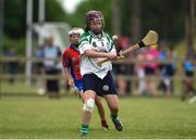 10 June 2018; Cavina Ni Maoldhamhnaigh of Abbeyknockmoy, in action against Shauna Muir of Shamrock, during the Division 1 Camogie shield final between Abbeyknockmoy, Co Galway and Shamrock, Co Galway, at the John West Féile na nGael national competition which took place this weekend across Connacht, Westmeath and Longford. This is the third year that the Féile na nGael and Féile Peile na nÓg have been sponsored by John West, one of the world’s leading suppliers of fish. The competition gives up-and-coming GAA superstars the chance to participate and play in their respective Féile tournament, at a level which suits their age, skills and strengths. Photo by Matt Browne/Sportsfile