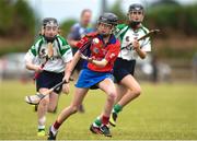10 June 2018; Shauna McGann of Abbeyknockmoy, in action against Shamrock, during the Division 1 Camogie shield final between Abbeyknockmoy, Co Galway and Shamrock, Co Galway, at the John West Féile na nGael national competition which took place this weekend across Connacht, Westmeath and Longford. This is the third year that the Féile na nGael and Féile Peile na nÓg have been sponsored by John West, one of the world’s leading suppliers of fish. The competition gives up-and-coming GAA superstars the chance to participate and play in their respective Féile tournament, at a level which suits their age, skills and strengths. Photo by Matt Browne/Sportsfile