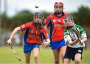 10 June 2018; Shauna McGann of Abbeyknockmoy, in action against Shauna Muir of Shamrock, during the Division 1 Camogie shield final between Abbeyknockmoy, Co Galway and Shamrock, Co Galway, at the John West Féile na nGael national competition which took place this weekend across Connacht, Westmeath and Longford. This is the third year that the Féile na nGael and Féile Peile na nÓg have been sponsored by John West, one of the world’s leading suppliers of fish. The competition gives up-and-coming GAA superstars the chance to participate and play in their respective Féile tournament, at a level which suits their age, skills and strengths. Photo by Matt Browne/Sportsfile