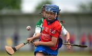 10 June 2018; Emma Joyce of Abbeyknockmoy, in action against Isabelle Sceala of Shamrock, during the Division 1 Camogie shield final between Abbeyknockmoy, Co Galway and Shamrock, Co Galway, at the John West Féile na nGael national competition which took place this weekend across Connacht, Westmeath and Longford. This is the third year that the Féile na nGael and Féile Peile na nÓg have been sponsored by John West, one of the world’s leading suppliers of fish. The competition gives up-and-coming GAA superstars the chance to participate and play in their respective Féile tournament, at a level which suits their age, skills and strengths. Photo by Matt Browne/Sportsfile