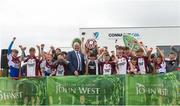 10 June 2018; Conor Lyng captain of Kilnadeema-Leitrim from Co Galway, lifts the trophy after the Division 2 Hurling shield final, at the John West Féile na nGael national competition which took place this weekend across Connacht, Westmeath and Longford. This is the third year that the Féile na nGael and Féile Peile na nÓg have been sponsored by John West, one of the world’s leading suppliers of fish. The competition gives up-and-coming GAA superstars the chance to participate and play in their respective Féile tournament, at a level which suits their age, skills and strengths. Photo by Matt Browne/Sportsfile