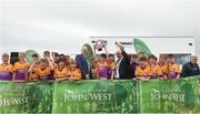 10 June 2018; Oisin Ivers captain of Kinvara Co Galway, lifts the trophy after the Division 3 shield Hurling final, at the John West Féile na nGael national competition which took place this weekend across Connacht, Westmeath and Longford. This is the third year that the Féile na nGael and Féile Peile na nÓg have been sponsored by John West, one of the world’s leading suppliers of fish. The competition gives up-and-coming GAA superstars the chance to participate and play in their respective Féile tournament, at a level which suits their age, skills and strengths. Photo by Matt Browne/Sportsfile