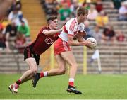 10 June 2018; Anton Tohill of Derry in action against Owen McCabe of Down during the Eirgrid Ulster GAA Football U20 Championship match between Down and Derry at St Tiernach's Park in Clones, Monaghan.  Photo by Oliver McVeigh/Sportsfile