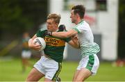 15 June 2018; Bryan Sweeney of Kerry in action against Karl Maloney of Limerick during the EirGrid Munster GAA Football U20 Championship quarter-final match between Limerick and Kerry in Newcastlewest, Co. Limerick. Photo by Diarmuid Greene/Sportsfile