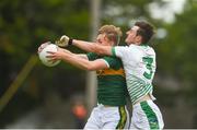 15 June 2018; Bryan Sweeney of Kerry in action against Karl Maloney of Limerick during the EirGrid Munster GAA Football U20 Championship quarter-final match between Limerick and Kerry in Newcastlewest, Co. Limerick. Photo by Diarmuid Greene/Sportsfile