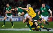 16 June 2018; Robbie Henshaw of Ireland is tackled by Adam Coleman and Bernard Foley of Australia during the 2018 Mitsubishi Estate Ireland Series 2nd Test match between Australia and Ireland at AAMI Park, in Melbourne, Australia. Photo by Brendan Moran/Sportsfile