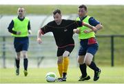 16 June 2018; Paul McGeeney of Ulster 2 in action against Sean Murphy of Munster 2 during the Special Olympics 2018 Ireland Games at the FAI National Training Centre in Abbotstown, Dublin. Photo by Ramsey Cardy/Sportsfile