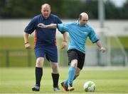 16 June 2018; Gary Burton of of Eastern 3 in action against Christopher Brophy of Munster 4 during the Special Olympics 2018 Ireland Games at the FAI National Training Centre in Abbotstown, Dublin. Photo by Ramsey Cardy/Sportsfile