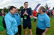 16 June 2018; Dublin footballer Brian Fenton with members of the Eastern 3 team during the Special Olympics 2018 Ireland Games at the FAI National Training Centre in Abbotstown, Dublin. Photo by Ramsey Cardy/Sportsfile