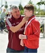 16 June 2018; DJ Dunleavy of Team Munster who won a gold medal in the 50m run alongside his father Liam Dunleavy, from Dungourney, Co Cork, at the Special Olympics 2018 Ireland Games at The National Indoor Arena, National Sports Campus in Abbotstown, Dublin. Photo by David Fitzgerald/Sportsfile