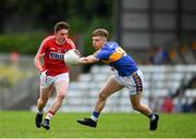 16 June 2018; Mathnew Bradley of Cork in action against Conor O’Sullivan of Tipperary during the EirGrid Munster GAA Football U20 Championship quarter-final match between Cork and Tipperary at Páirc UÍ Rinn, Cork. Photo by Eóin Noonan/Sportsfile