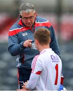 16 June 2018; Cork manager Sean Hayes  speaking with Ian Giltinan of Cork following the EirGrid Munster GAA Football U20 Championship quarter-final match between Cork and Tipperary at Páirc UÍ Rinn, Cork. Photo by Eóin Noonan/Sportsfile